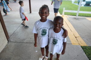 camp kids smiling happy friends