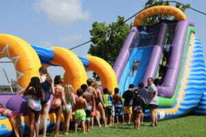 camp waterslide water swimming outdoors summer
